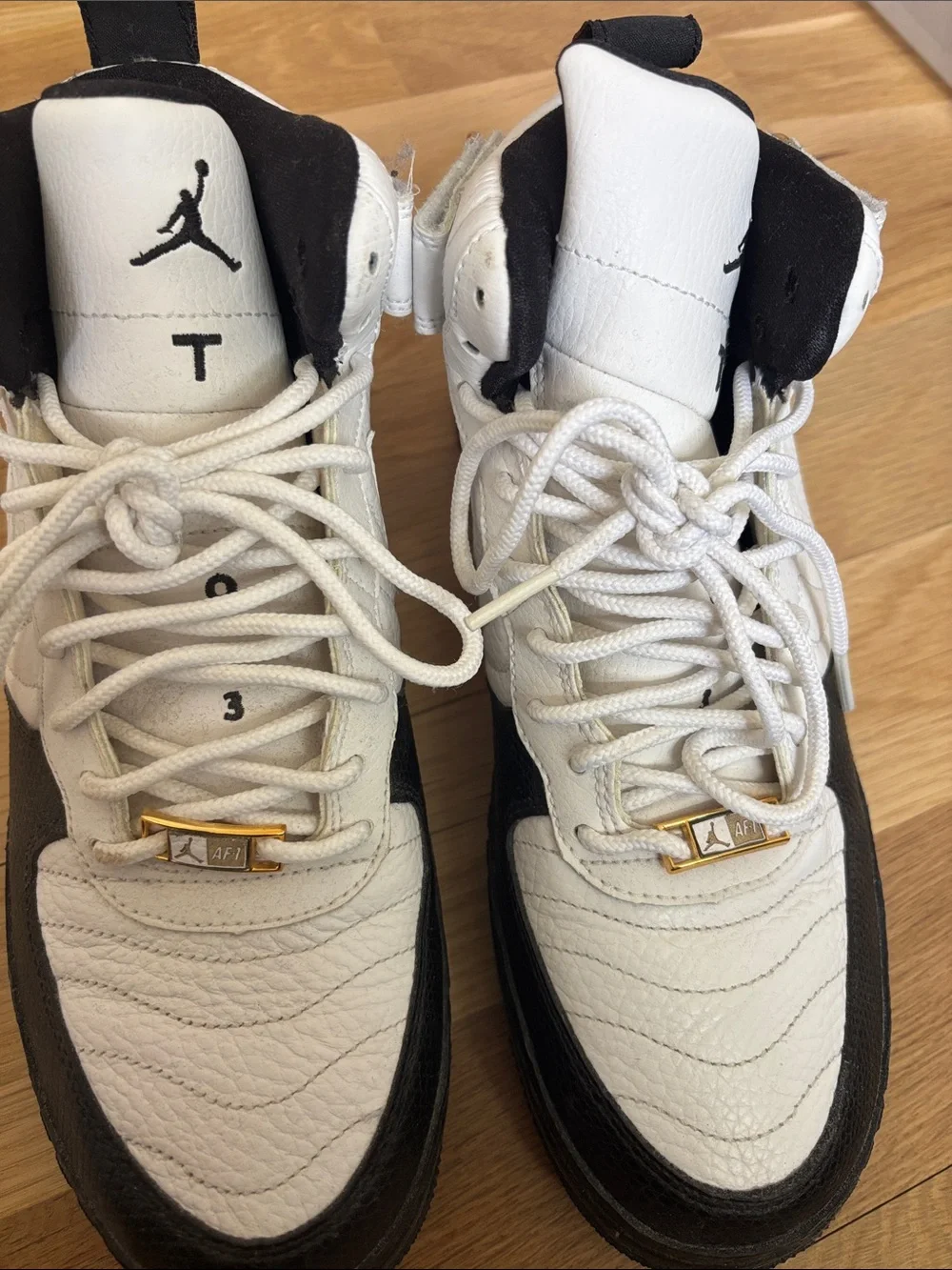 Jordan Force Taxi 12 White and Black High-Top Sneakers 8.5